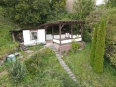 Verkauf Einfamilienhaus Benshausen überdachte Sitzecke mit Gartenhütte