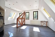 Verkauf Zweifamilienhaus Suhl Heinrichs Wohnzimmer mit Kamin