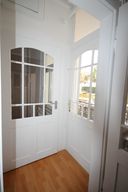 Verkauf 5-Zimmer-Eigentumswohnung in einem Altbau in der Innenstadt Zugang zum Balkon